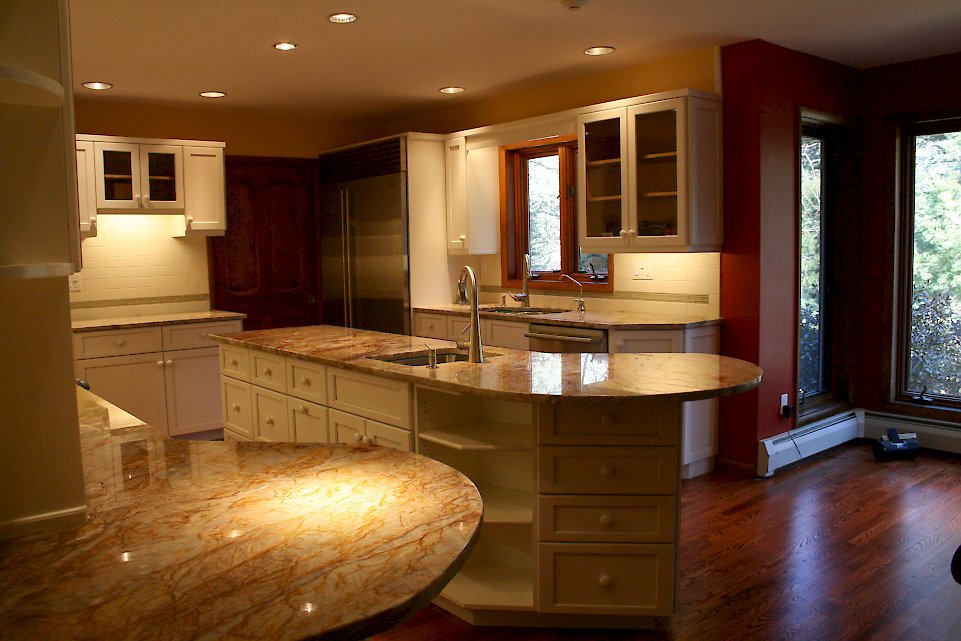 A kitchen refaced with white Conestoga doors.