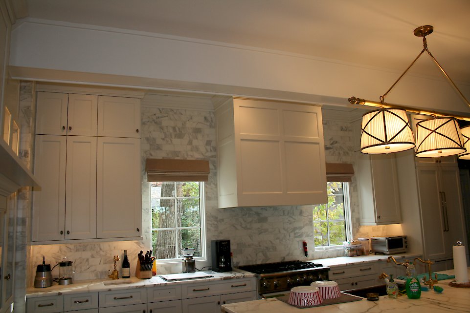 Double stacked cabinetry to the ceiling.