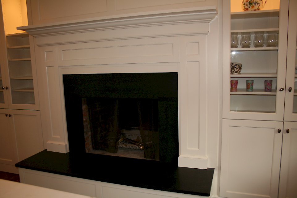 The fireplace area made to match the kitchen.