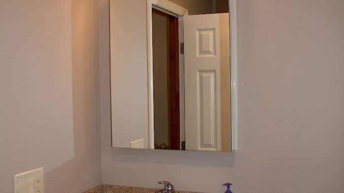 Maple vanity and Robern mirror/medicine cabinet.
