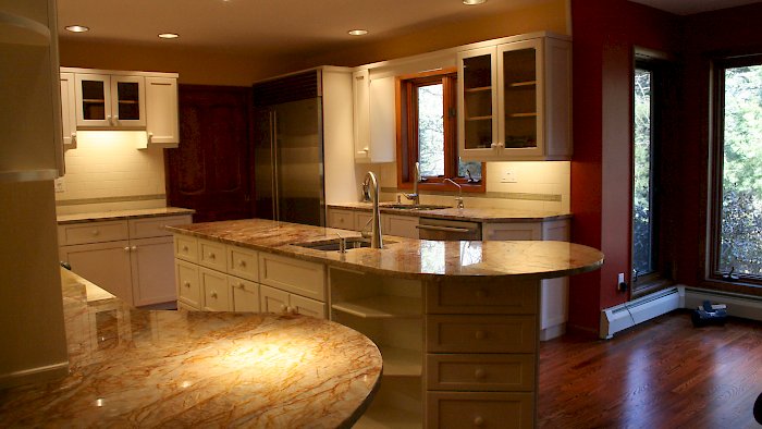 A kitchen refaced with white Conestoga doors.