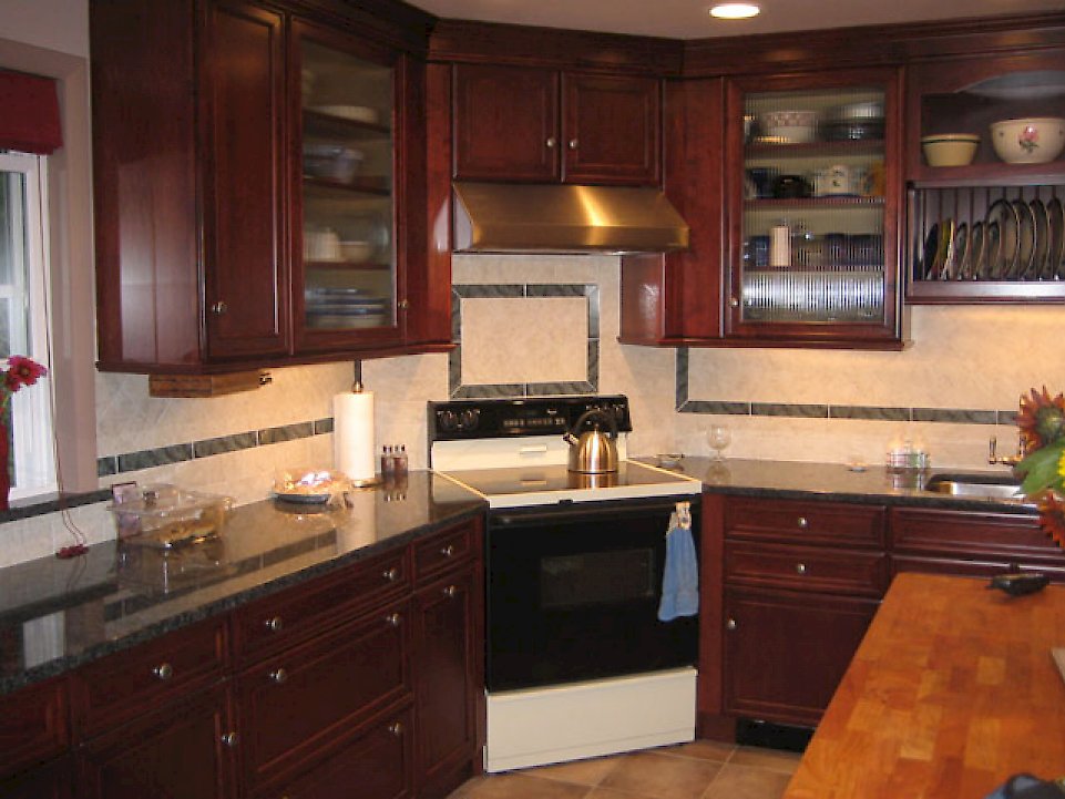 A maple cordovan brookhaven kitchen with the Pelhem Manor door style.