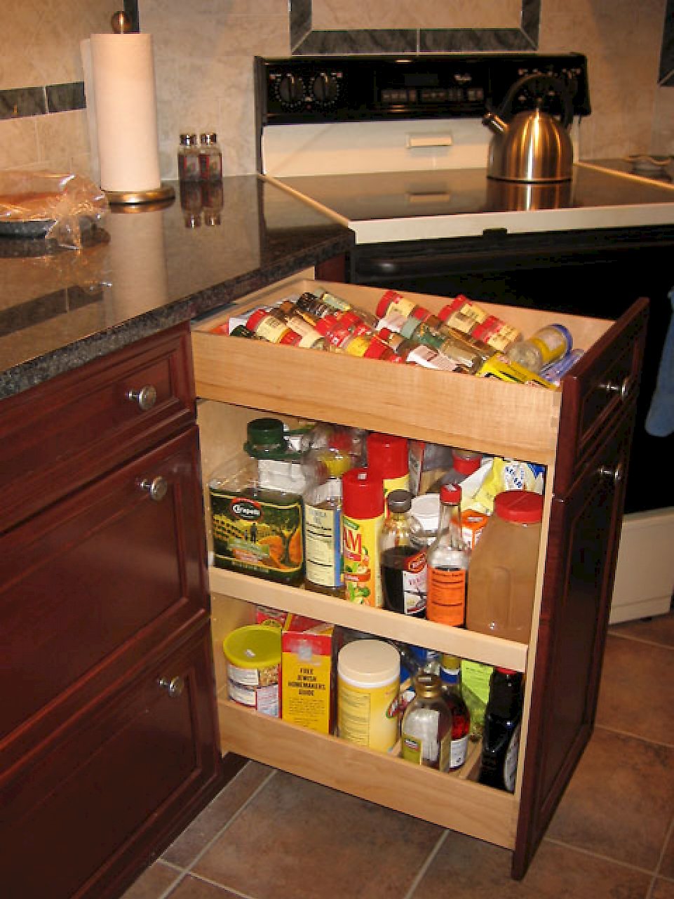 Full height wooden cabinet pull-out.