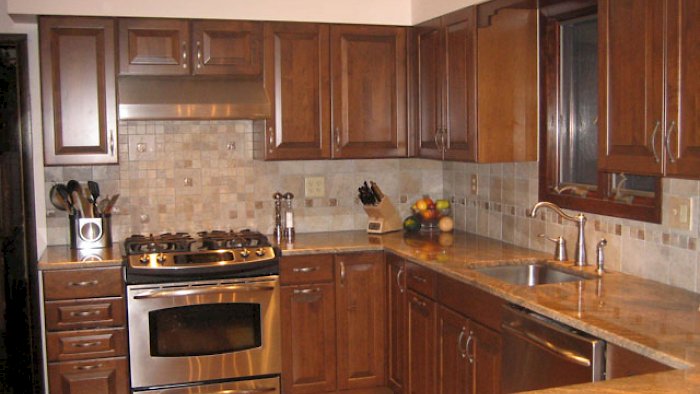 Nut brown kitchen with the Winfield Raised Square door style.