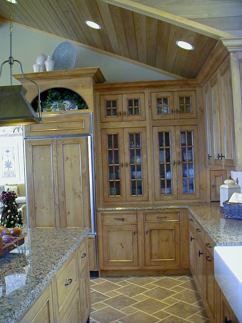 Sub-Zero 700BR refrigerator with custom distressed pine panels.