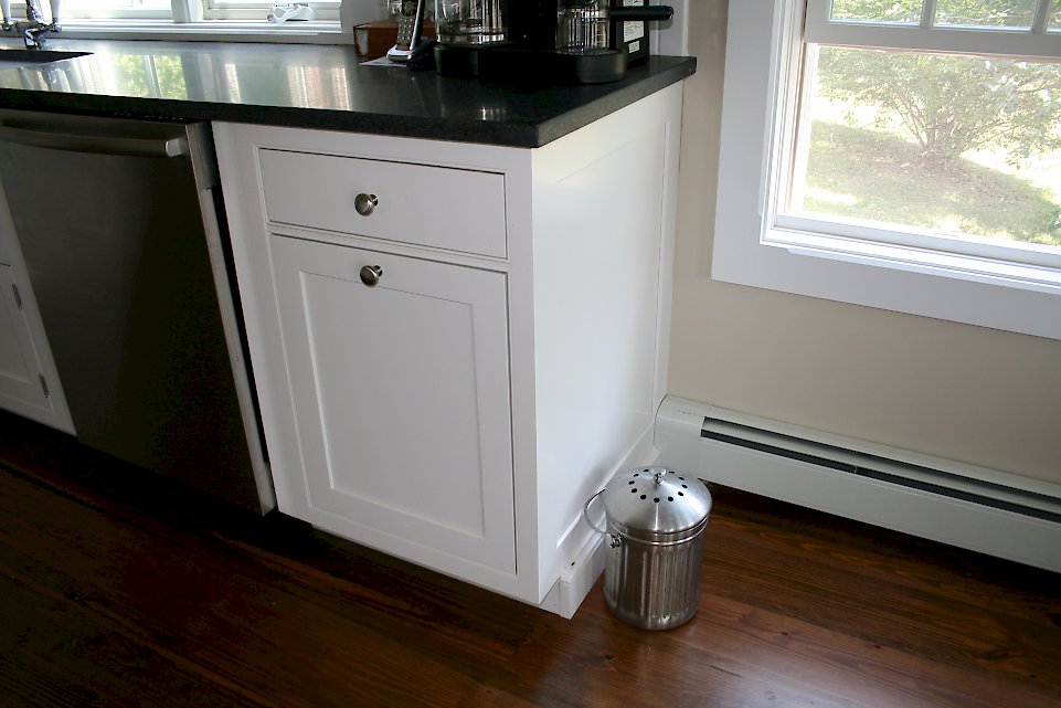 Concealed trash pull-out.