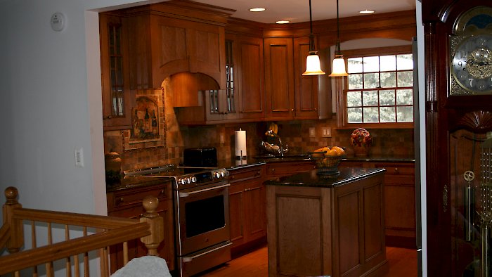 A rustic knotty cherry kitchen.