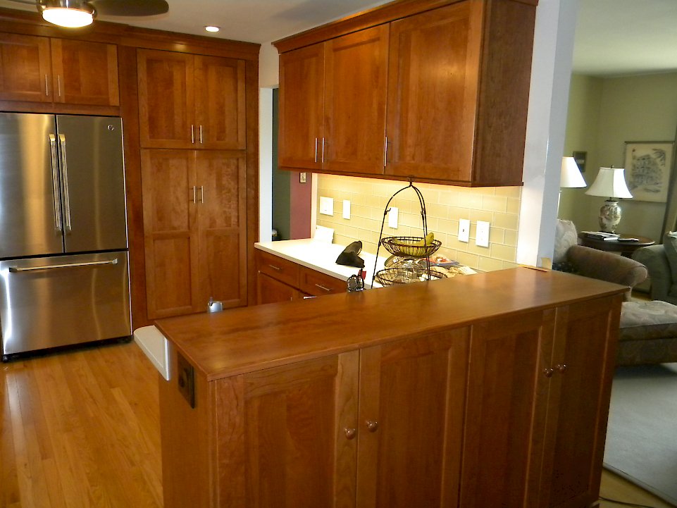 Bar height counter to match the cabinetry.