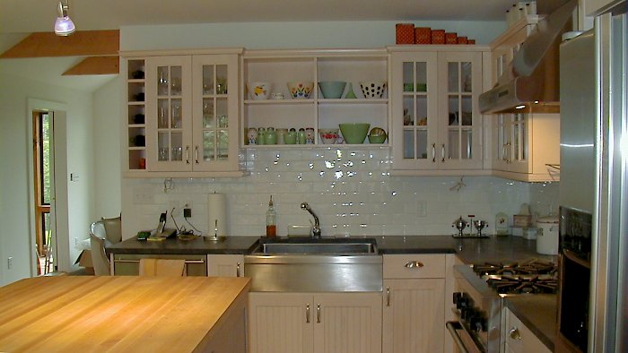 A beaded white Brookhaven Kitchen with Soapstone Counter-tops.