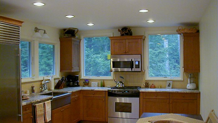 Cherry Wood-Mode kitchen with honed jupara persia granite counter-tops.