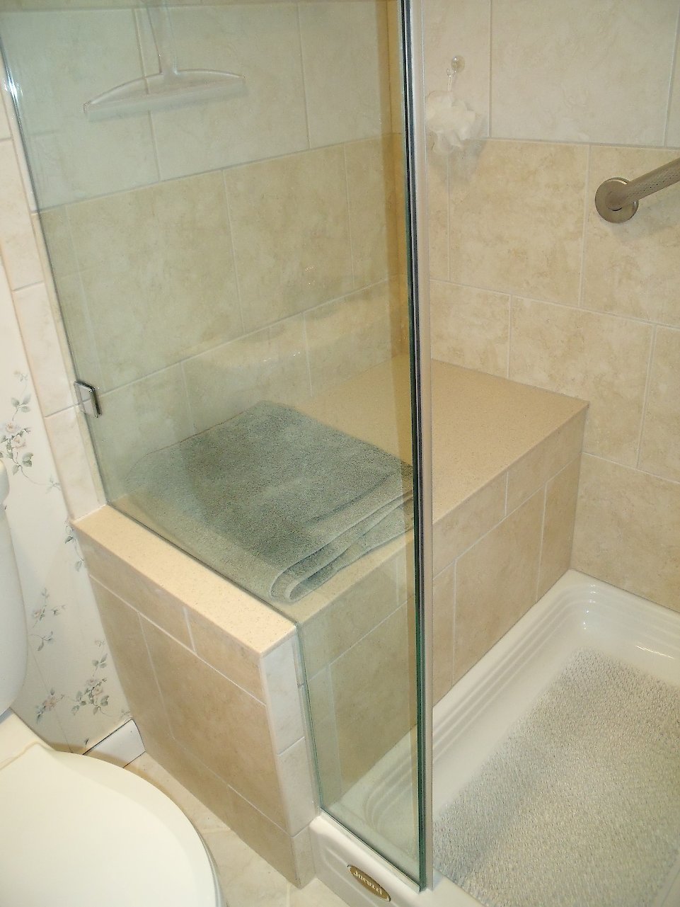 Corian Sierra Aurora seat in the shower.