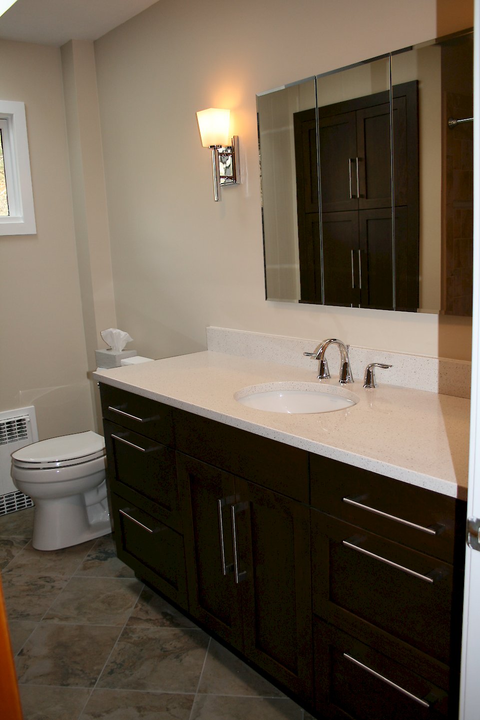 Bridgeport recessed vanity with dark lager finish.