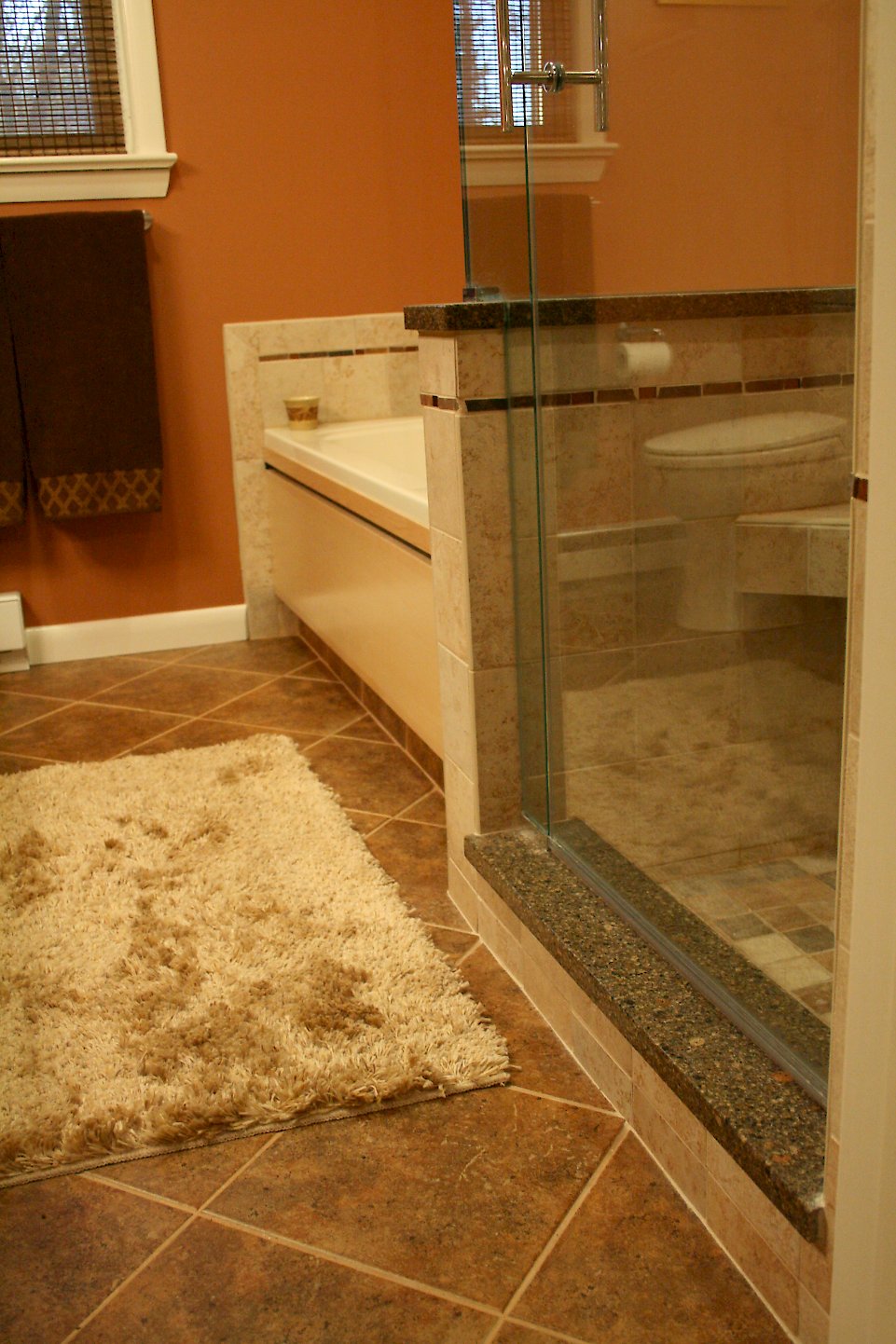 Cambria Ashford threshold on the shower curb.