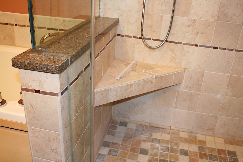 Custom tiled seat in the shower.