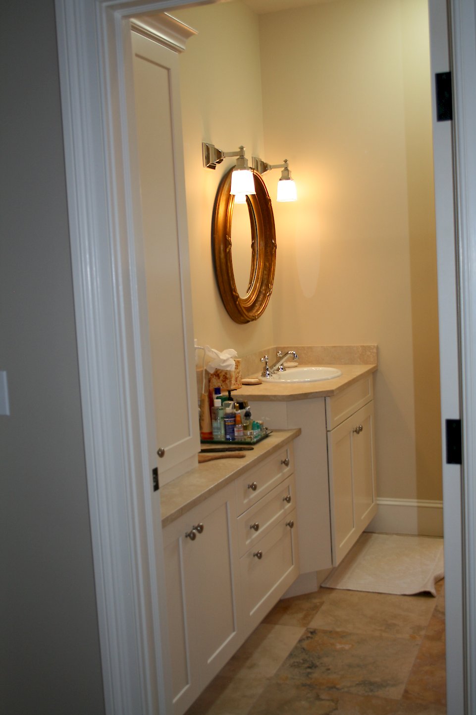 Antique white vanity cabinets.