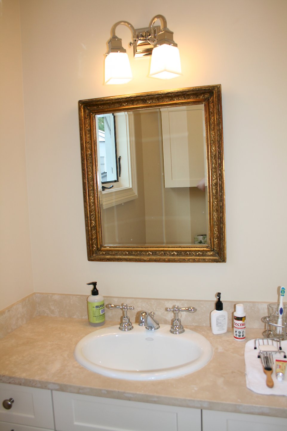 Close view of the limestone vanity top.