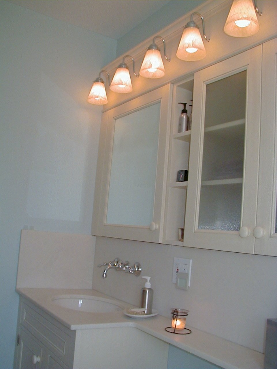 Wood-Mode vanity and medicine cabinet.