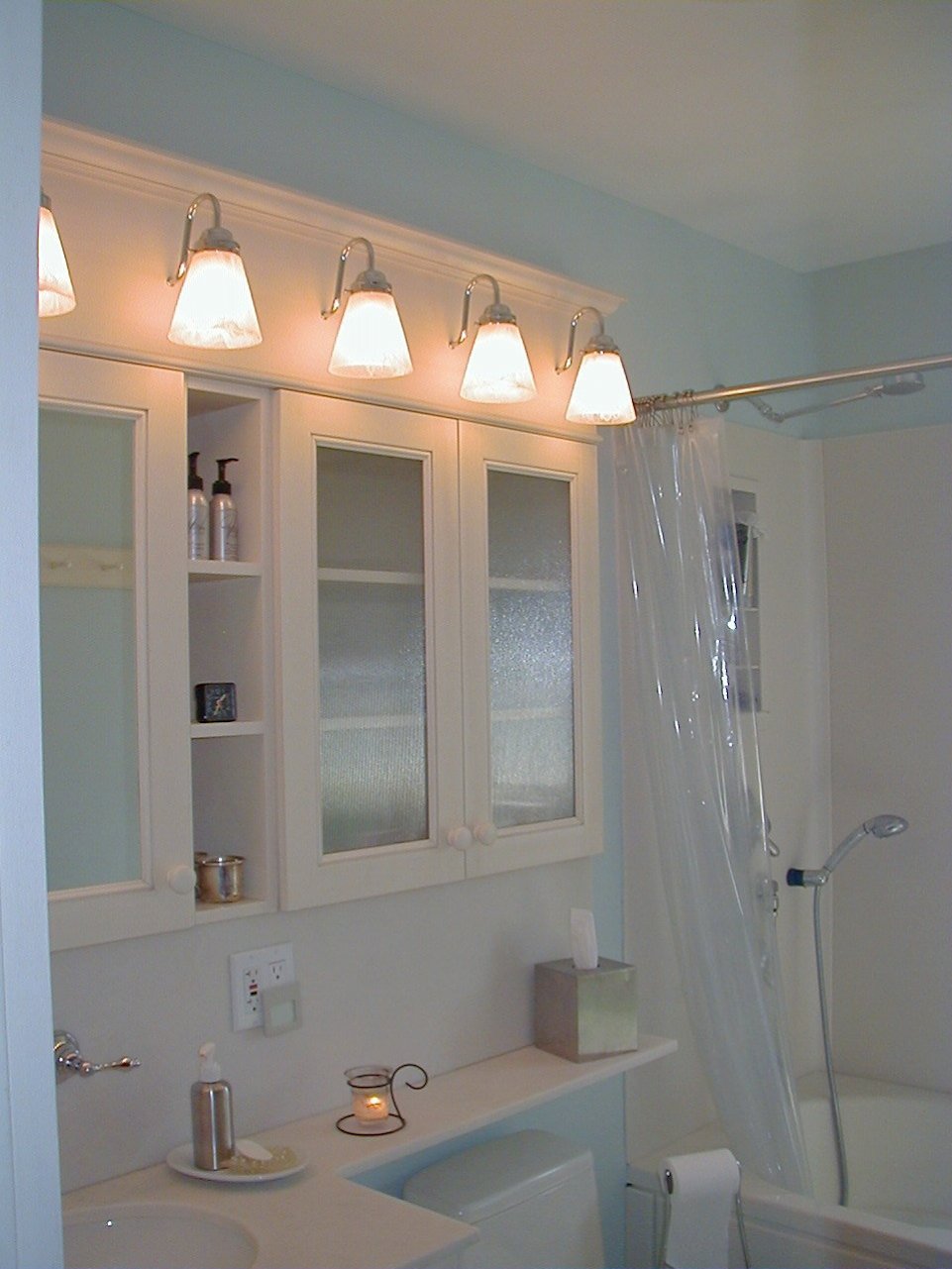 Decorative lighting over the vanity.